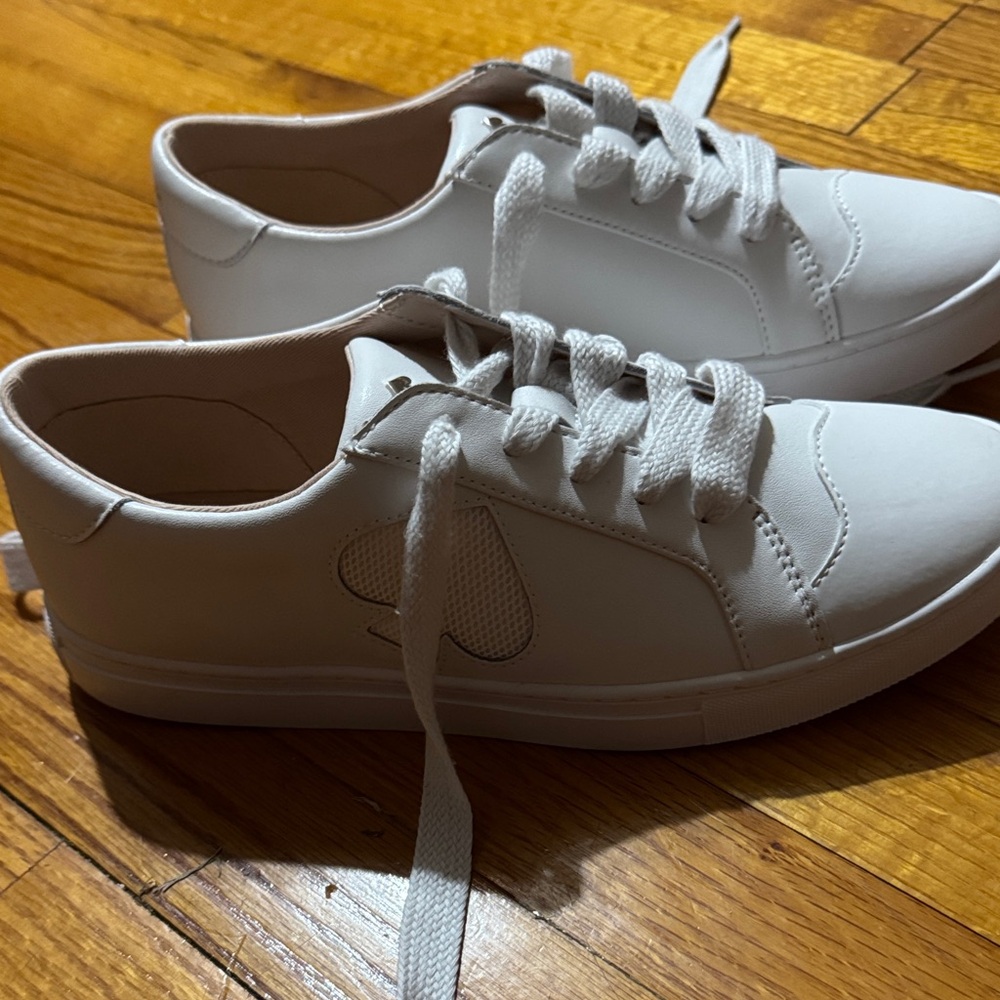 Kate Spade White Sneakers. Looks brand new! Check my other items out.